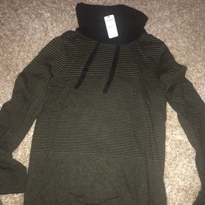 Long sleeved mock neck shirt